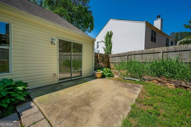 view of patio featuring a fenced backyard