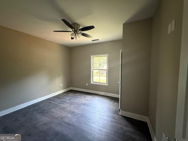 0 Worth St, Poulan, GA 31781 - spare room featuring a ceiling fan and baseboards