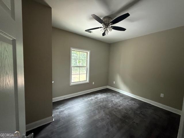 0 Worth St, Poulan, GA 31781 - spare room featuring ceiling fan and baseboards