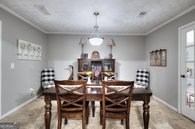 dining area with visible vents, carpet flooring, and baseboards