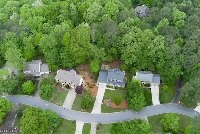 aerial view featuring a view of trees
