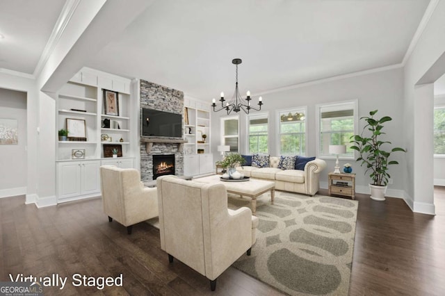 living room with dark wood-type flooring, baseboards, a notable chandelier, and a fireplace