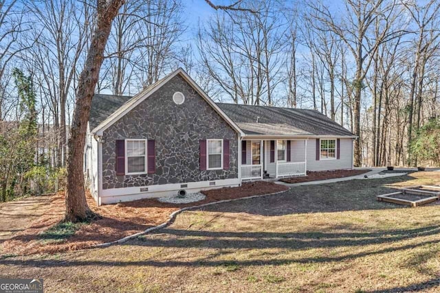 ranch-style home with a porch, crawl space, stone siding, and a front yard