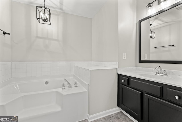 full bathroom with vanity and a bath