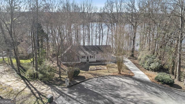 exterior space with a water view