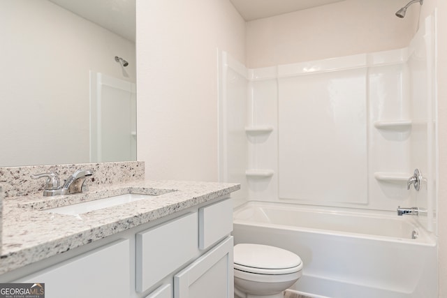 full bathroom with vanity,  shower combination, and toilet