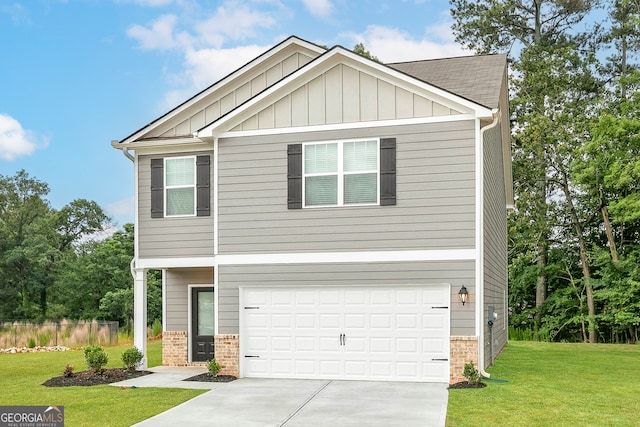 craftsman-style house featuring a garage, a front yard, brick siding, board and batten siding, and concrete driveway