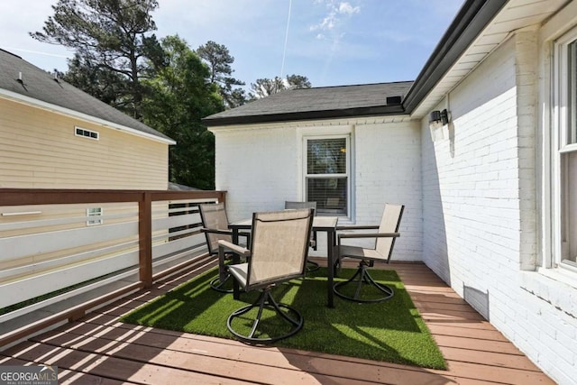 deck featuring outdoor dining space