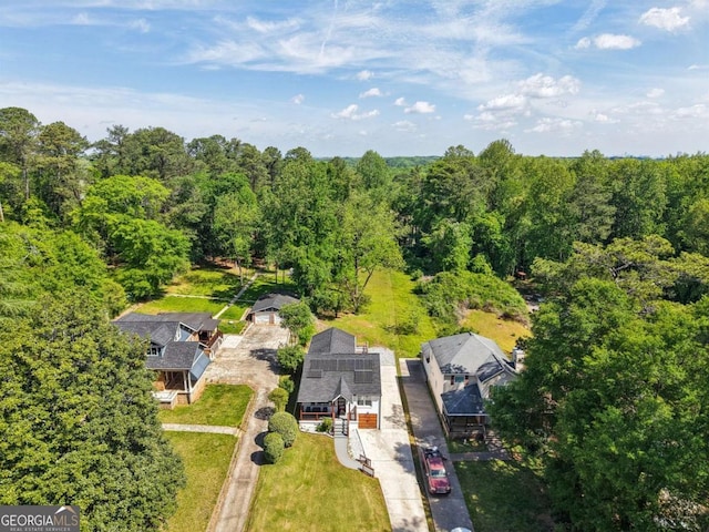 bird's eye view with a view of trees