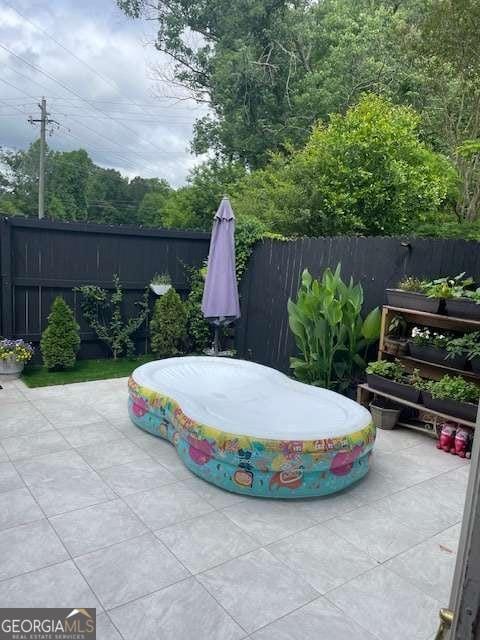 view of patio / terrace featuring a fenced backyard