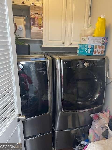 laundry room featuring independent washer and dryer
