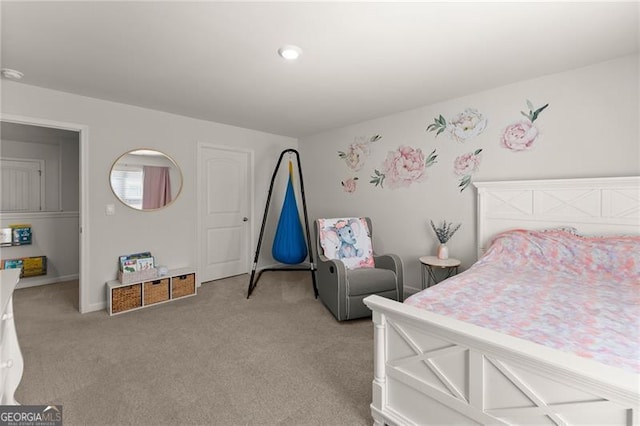 bedroom with light carpet