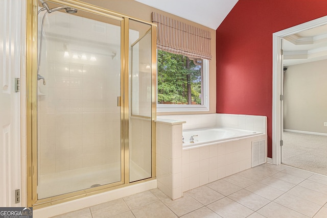 full bath featuring a bath, visible vents, tile patterned flooring, and a stall shower