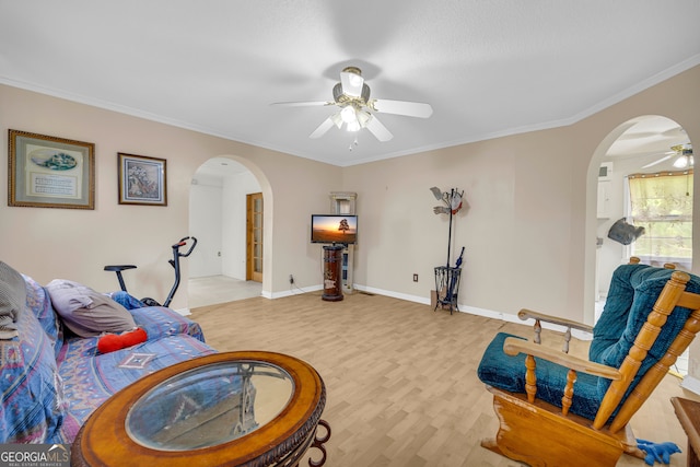 415 Scenic Dr, Toccoa, GA 30577 - living area with arched walkways, a ceiling fan, light wood-style flooring, and crown molding