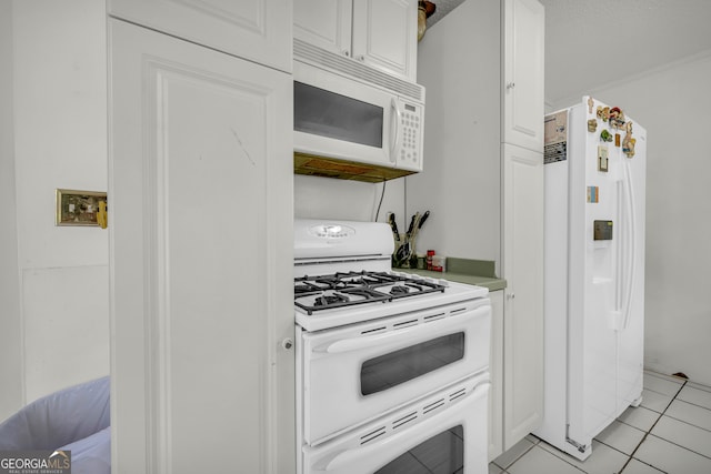 415 Scenic Dr, Toccoa, GA 30577 - kitchen with white appliances, white cabinetry, light tile patterned floors, and light countertops