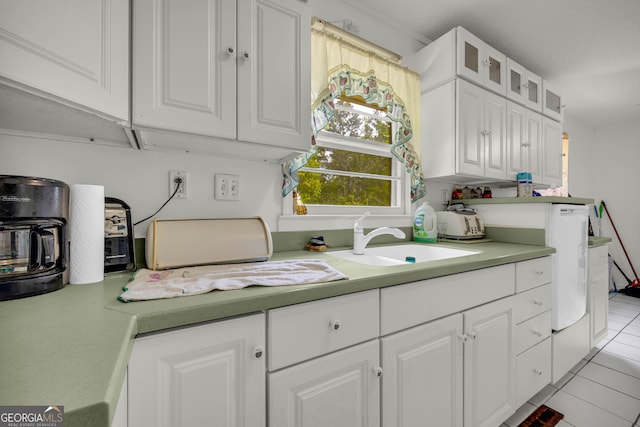 415 Scenic Dr, Toccoa, GA 30577 - kitchen featuring white cabinets, glass insert cabinets, light countertops, and light tile patterned flooring