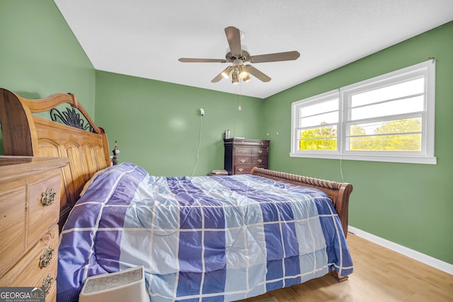 415 Scenic Dr, Toccoa, GA 30577 - bedroom featuring baseboards, ceiling fan, and wood finished floors