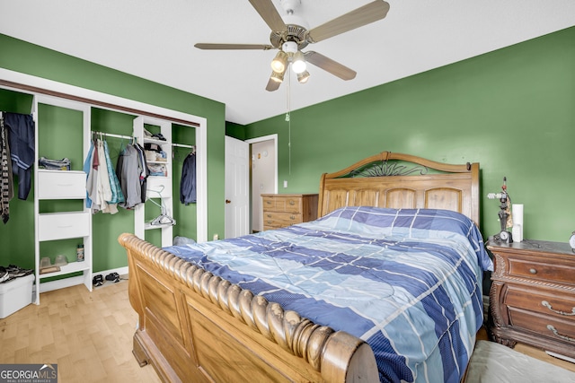 415 Scenic Dr, Toccoa, GA 30577 - bedroom with ceiling fan, a closet, and wood finished floors