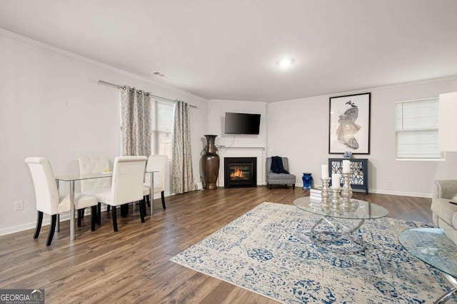 108 Berwick Xing, Dallas, GA 30157 - living room with visible vents, ornamental molding, and wood finished floors