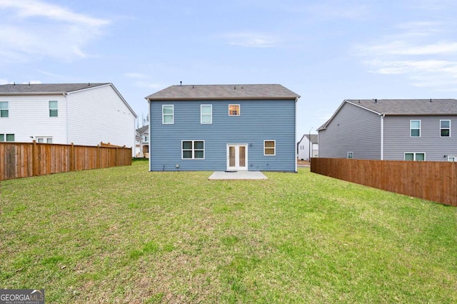 108 Berwick Xing, Dallas, GA 30157 - back of property with a fenced backyard, a lawn, and a patio area