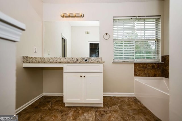 full bath with visible vents, vanity, baseboards, tile patterned floors, and a bath
