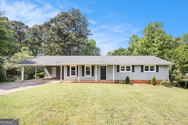 ranch-style home with a front lawn, driveway, an attached carport, and covered porch