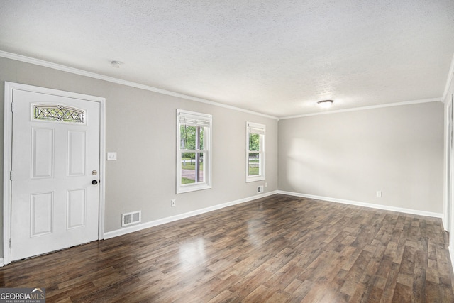 entryway with crown molding, a textured ceiling, visible vents, and dark wood-style floors