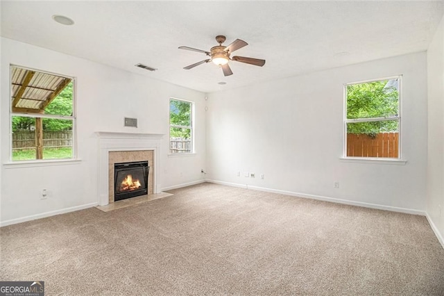 7454 Silver Arrow Trl SE, Austell, GA 30168 - unfurnished living room with a high end fireplace, carpet floors, and ceiling fan
