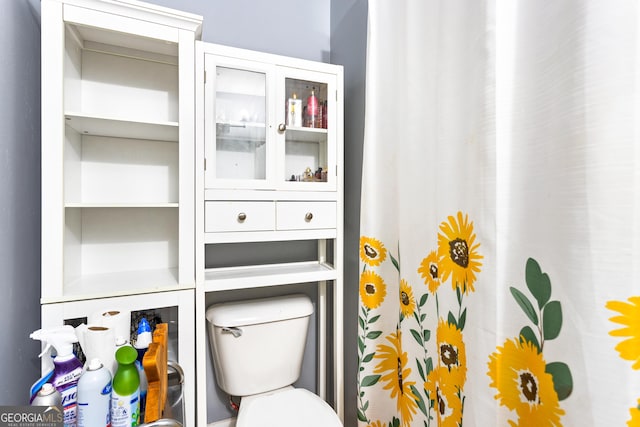 1114 Ivey Chase Pl, Dacula, GA 30019 - bathroom featuring toilet and a shower with shower curtain