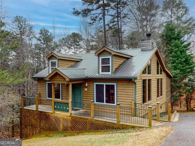 685 Monroe Ridge Rd, Sautee Nacoochee, GA 30571 - rear view of property with aphalt driveway, log veneer siding, a chimney, and metal roof