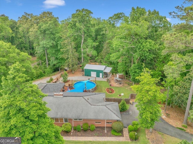 aerial view featuring a forest view