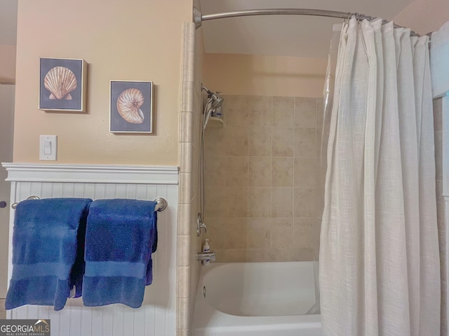 full bathroom featuring shower / bath combo with shower curtain
