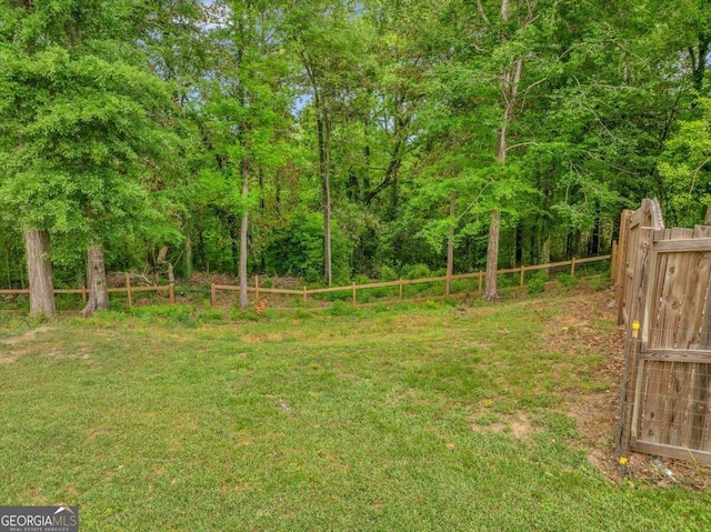 view of yard with fence