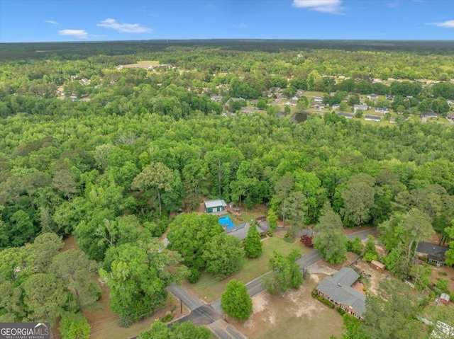 aerial view featuring a forest view