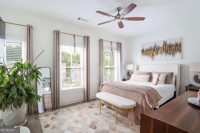 3272 Stillwood Dr, Atlanta, GA 30354 - bedroom featuring baseboards, multiple windows, ceiling fan, and visible vents