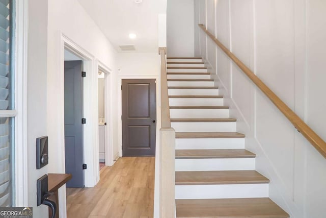 3272 Stillwood Dr, Atlanta, GA 30354 - stairs featuring recessed lighting, visible vents, and wood finished floors
