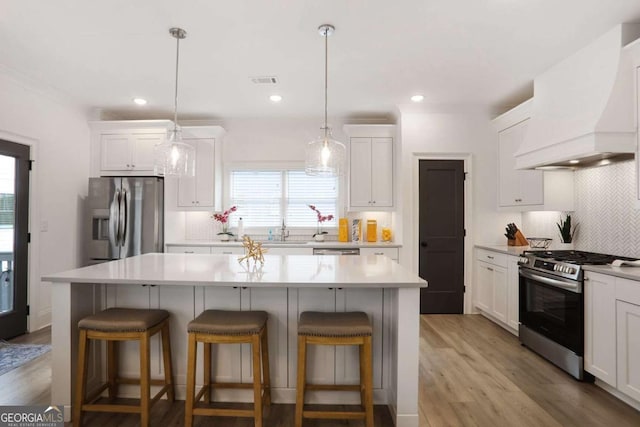 3272 Stillwood Dr, Atlanta, GA 30354 - kitchen with backsplash, white cabinets, and stainless steel appliances