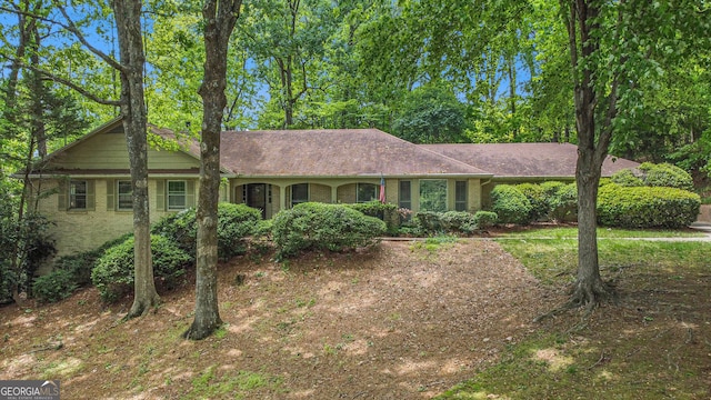 ranch-style home with brick siding
