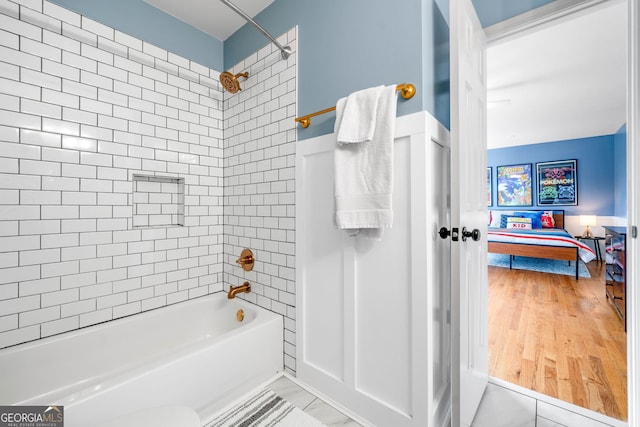 full bathroom with connected bathroom and tub / shower combination