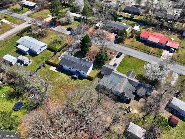 birds eye view of property with a residential view