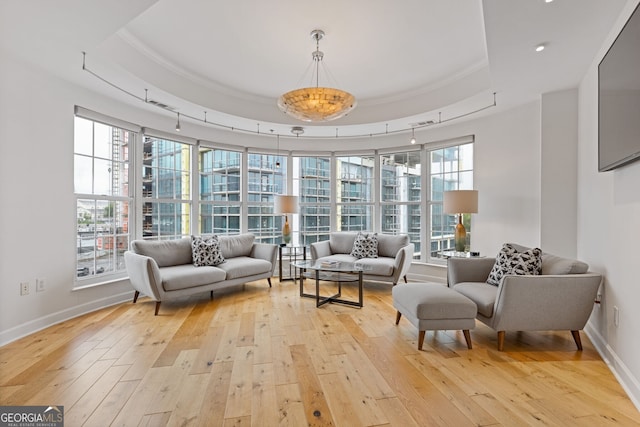 sunroom with rail lighting and visible vents