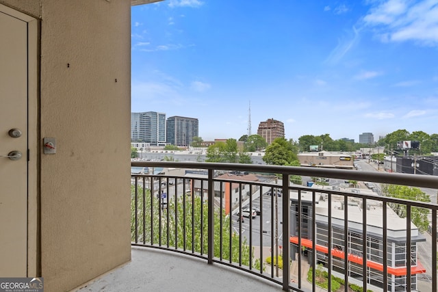 balcony featuring a city view