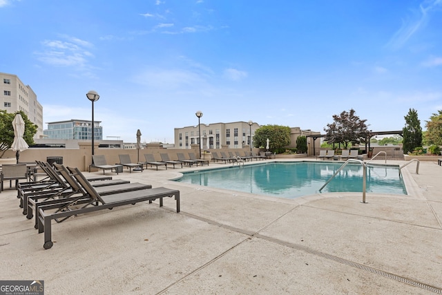 community pool with a patio