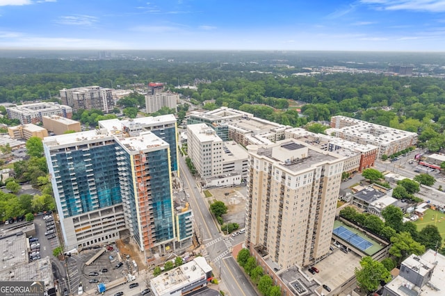 birds eye view of property featuring a city view