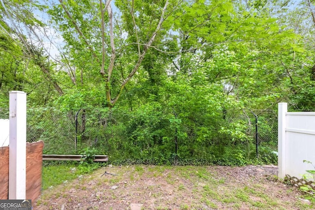 view of yard featuring fence