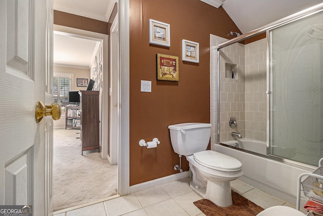 full bathroom featuring baseboards, tile patterned floors, combined bath / shower with glass door, toilet, and ornamental molding