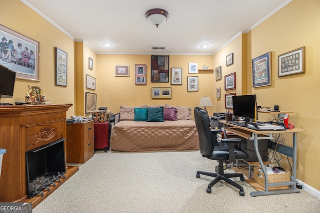 office area with visible vents, carpet flooring, baseboards, and ornamental molding
