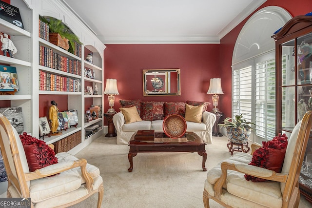 sitting room featuring ornamental molding, built in features, and carpet flooring