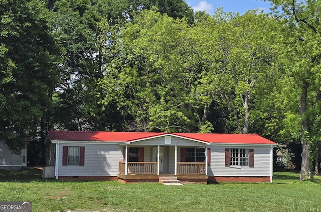 50 E College St, Royston, GA 30662 - manufactured / mobile home with a porch, a front lawn, crawl space, and metal roof