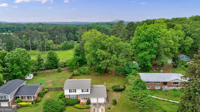 aerial view featuring a forest view